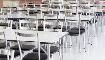 stainless-steel-tables-chairs-high-school-student-canteen_44651-378